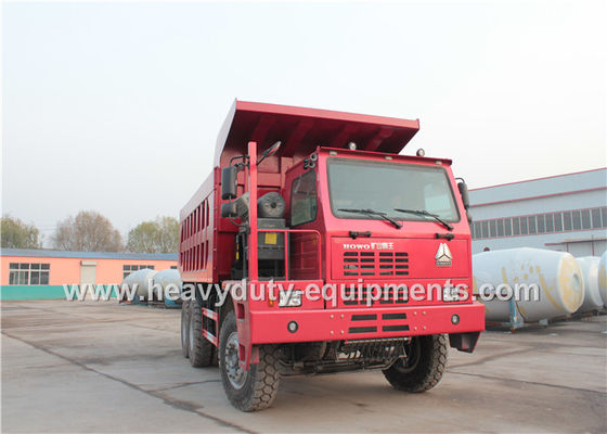 Sinotruk howo heavy duty loading mining dump truck for big rocks in wet mining road nhà cung cấp